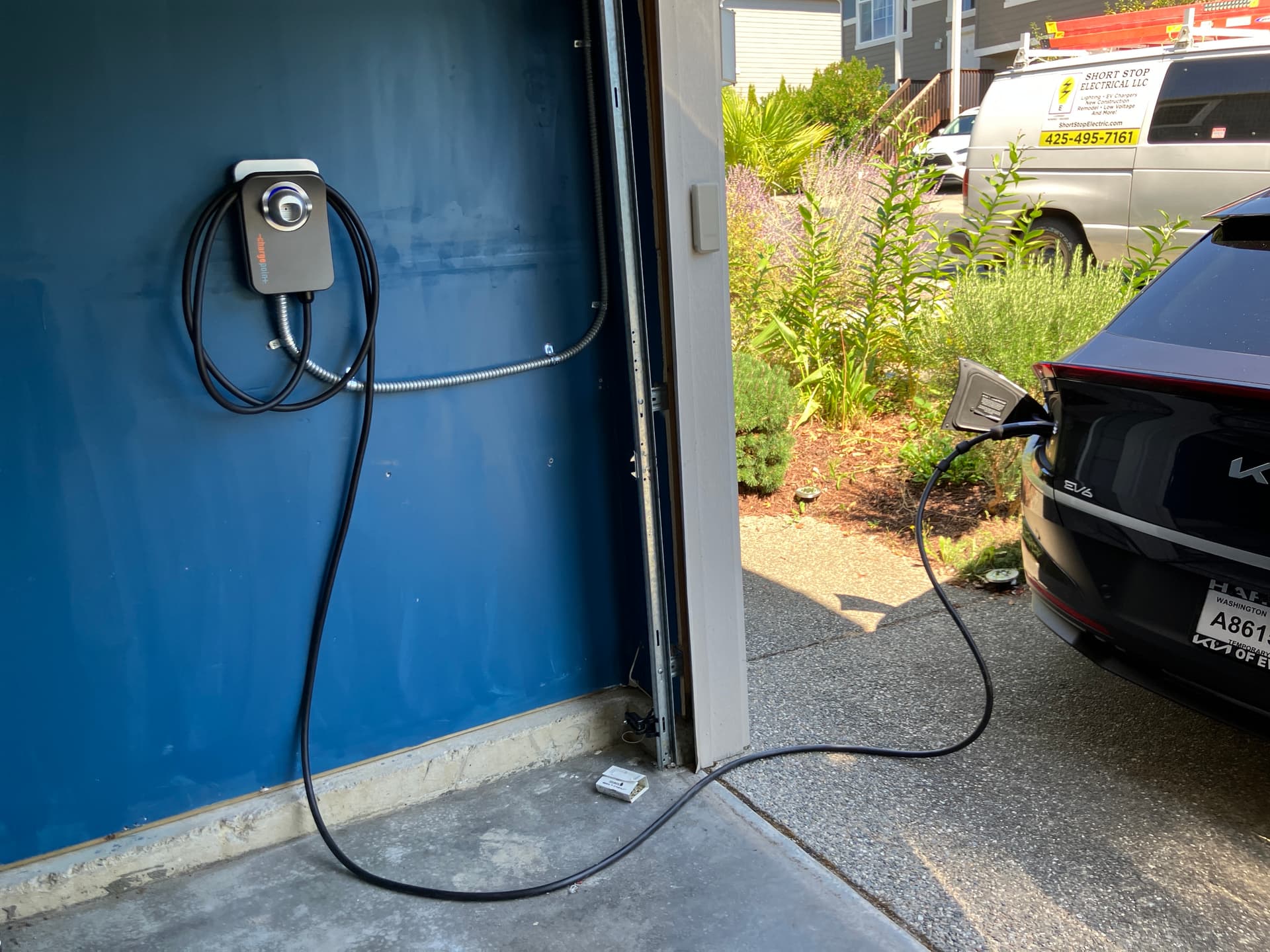 Level 2 EV charger installed in a Tacoma garage